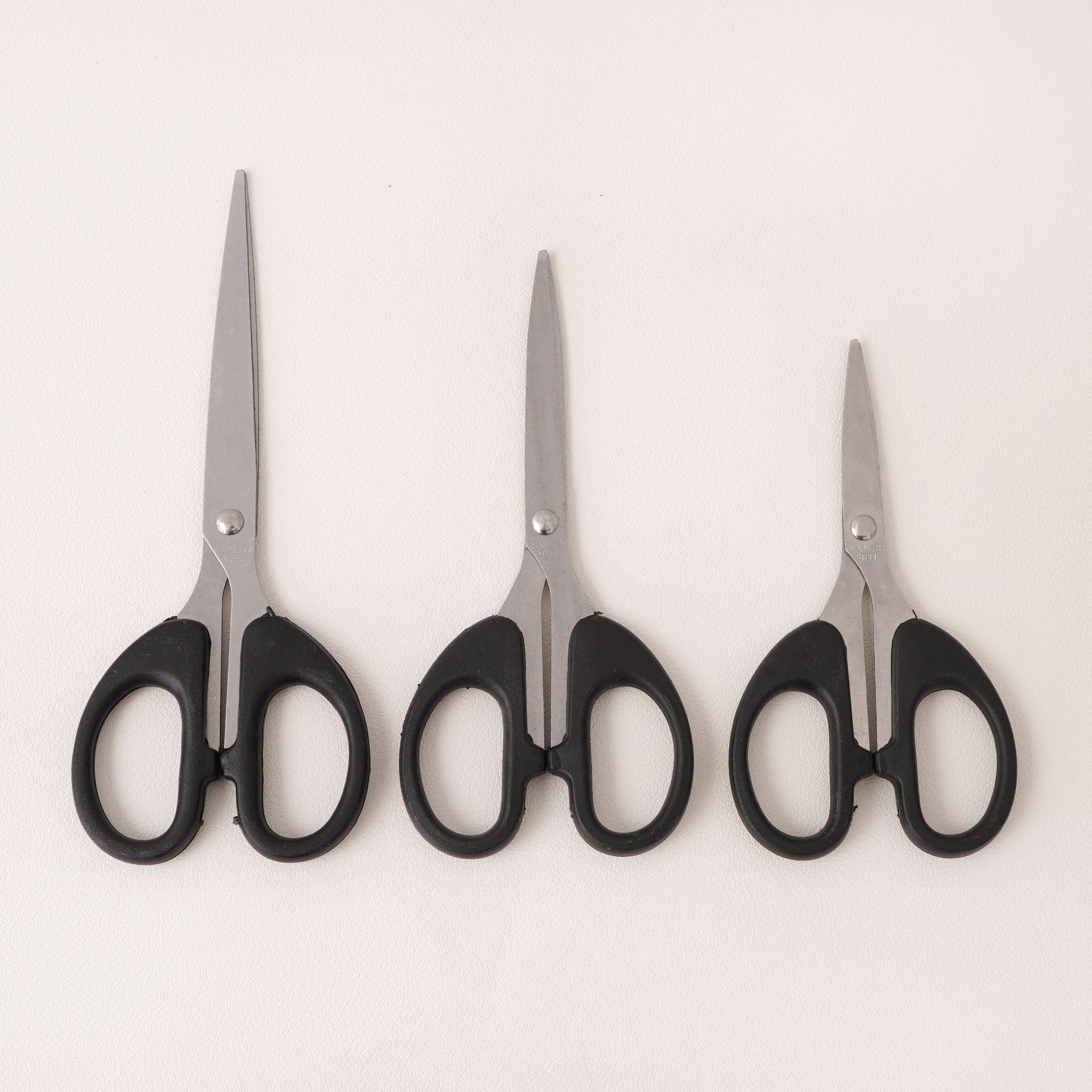 Pointed stainless steel multi-purpose scissors with black handle for DIY crafts, office and home use, stationery cutting and sewing, available in large, medium, and small sizes Secondary image