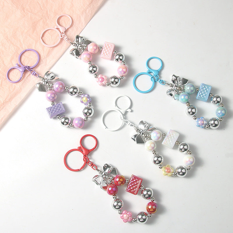 Creative and versatile candy-colored flower bag pendant keychain acrylic beaded phone chain accessory サブ画像