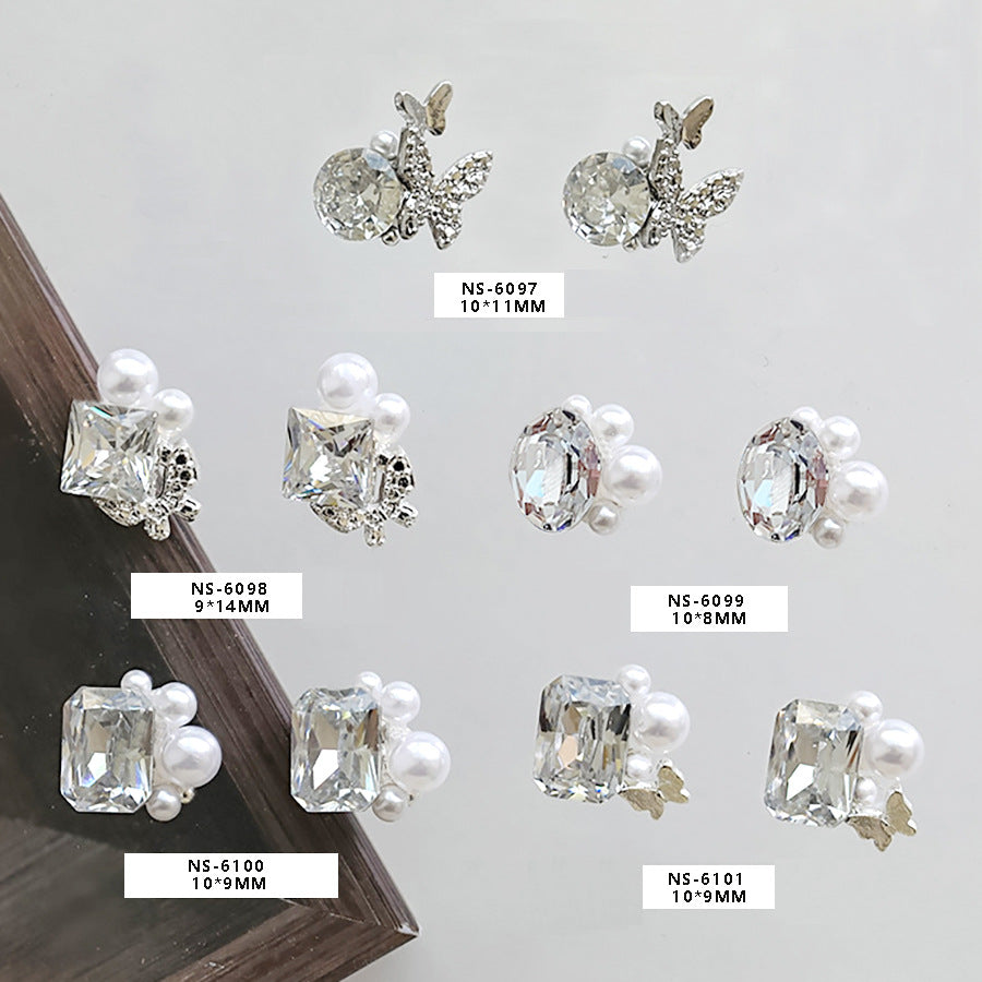 Transparent white pigeon egg nail art decoration with hand-set pearls, 3D butterfly, sparkling nail art diamond ball Secondary image