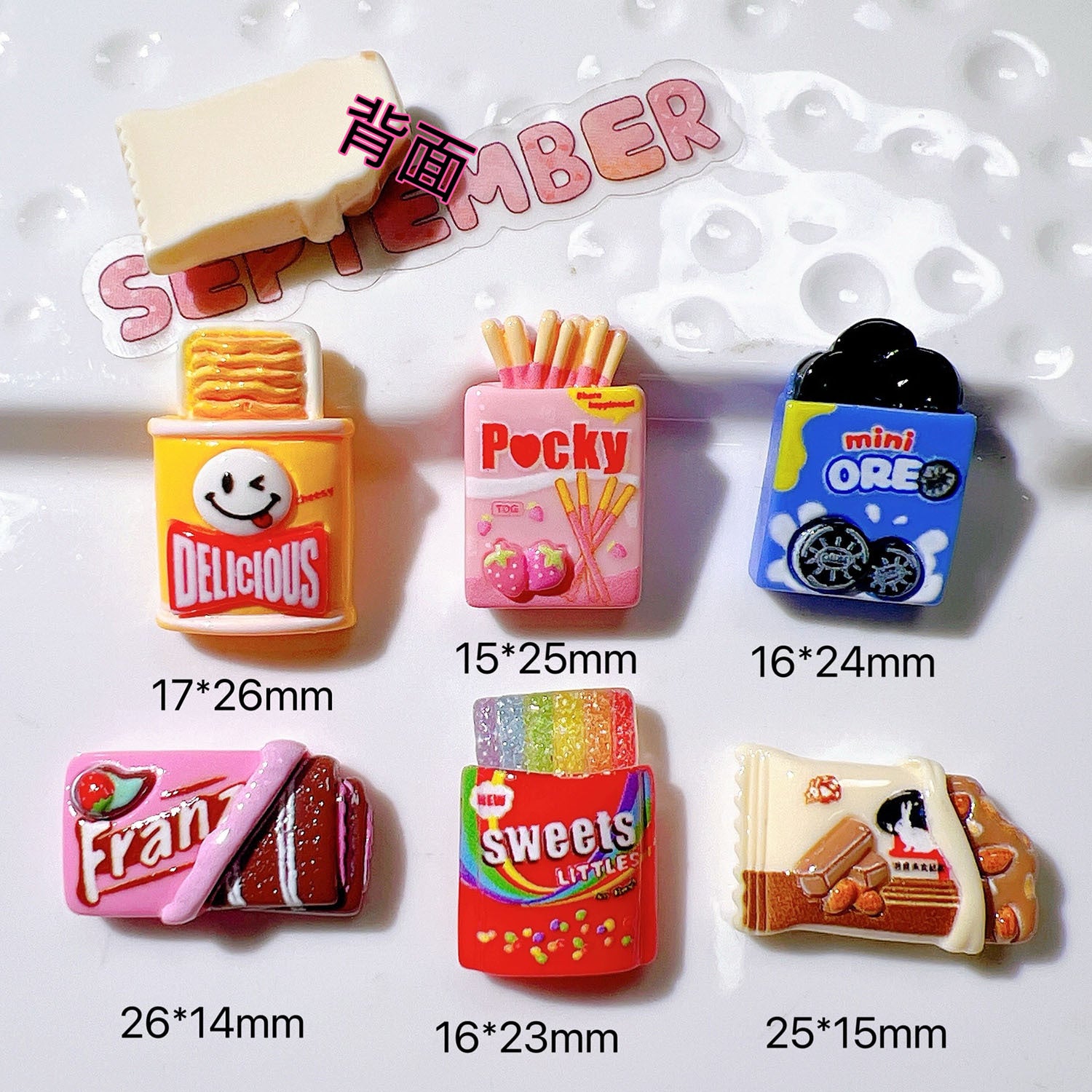 diy Materials: Hair clips, shoe charms, cream glue, stationery, straw toppers, patches, hair accessories, rainbow candies Secondary image